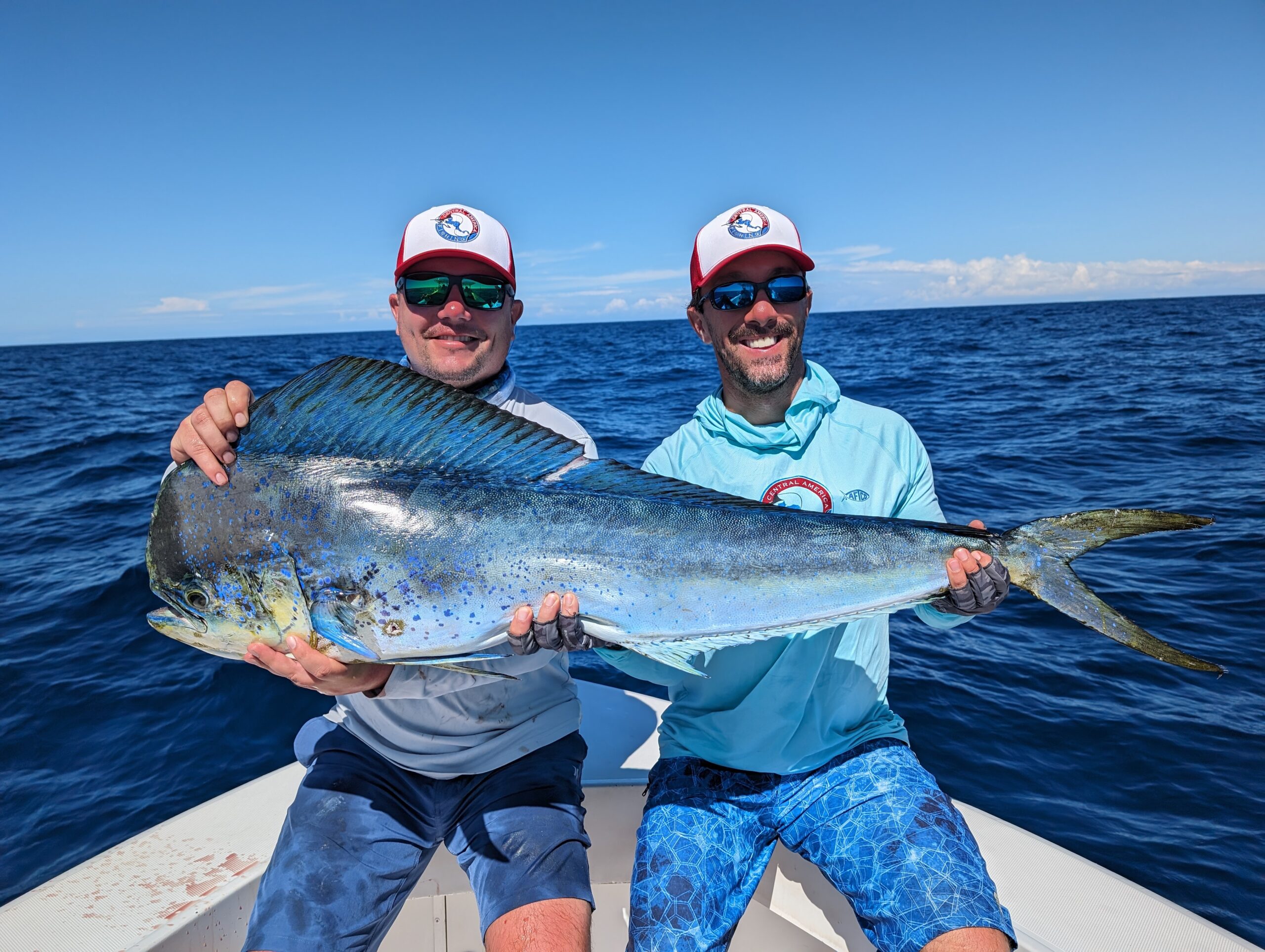 CAF owner & host with a client and his nice dorado