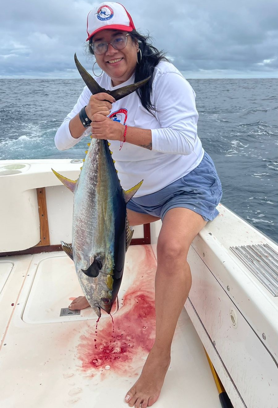 CAF's Ilona Maroto and her first yellowfin tuna in Quepos